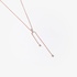 Long pink gold pendant with diamonds