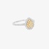 diamond ring with a pear cut yellow diamond at the center