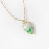 Large heart shaped jade pendant with pearls