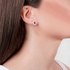 Ruby rosette earrings with diamonds
