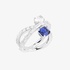 White gold double ring with diamonds and an emerald cut sapphire
