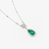 White gold emerald drop pendant with diamonds