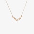 Gold chain necklace with stars and hearts