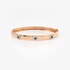 Pink gold bangle with evil eyes