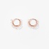Fine pink gold hoops with round rose cut diamonds
