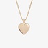 Gold heart shaped picture locket