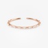 Luxurious pink gold bangle with diamonds