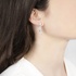 White gold pear shape earrings with baguette diamonds