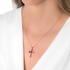 Pink gold cross pendant with rainbow colored sapphires