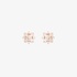 Tiny pink gold flower studs with baguette diamonds