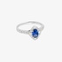 White gold solitaire sapphire ring with diamonds