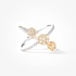 white gold flower ring with diaonds in yellow gold setting