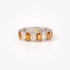 Orange sapphires and diamonds in a band